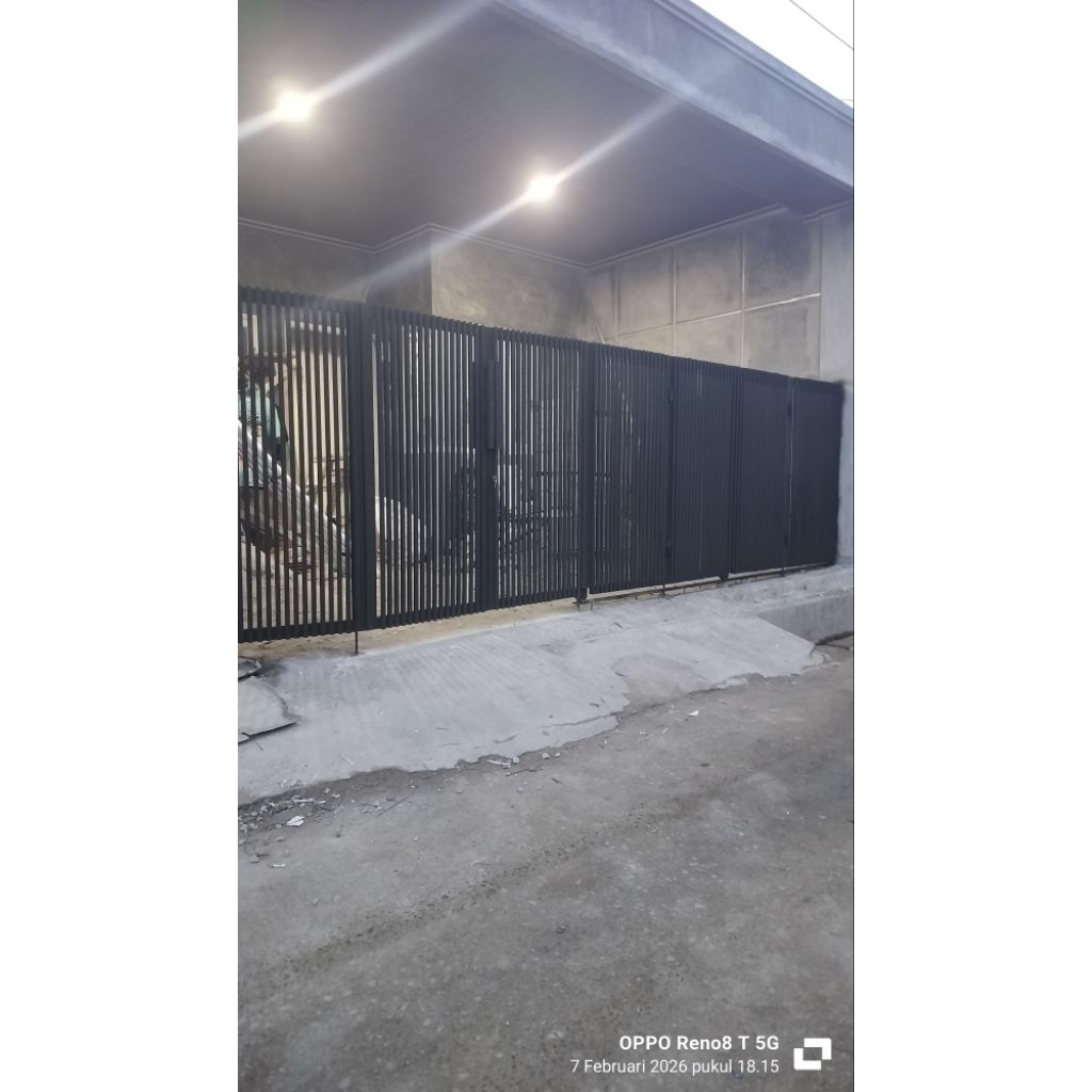 pintu besi lipat minimalis modern  jari-jari