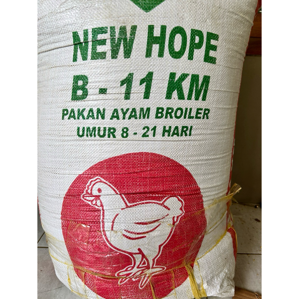 PAKAN AYAM RAS PEDAGING NEW HOPE B 11 KM pur pakan anak ayam broiler repack 1kg