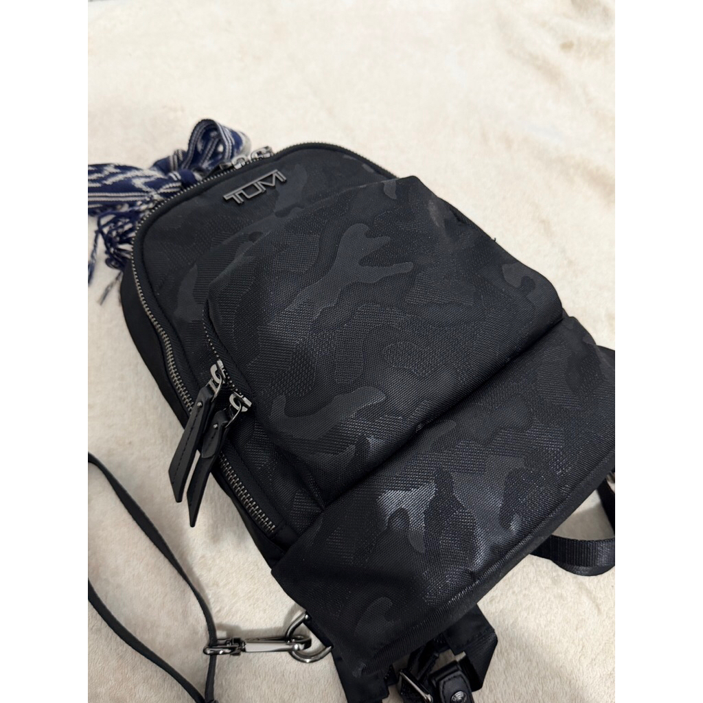 TAS TUMI SLING BACKPACK ORI