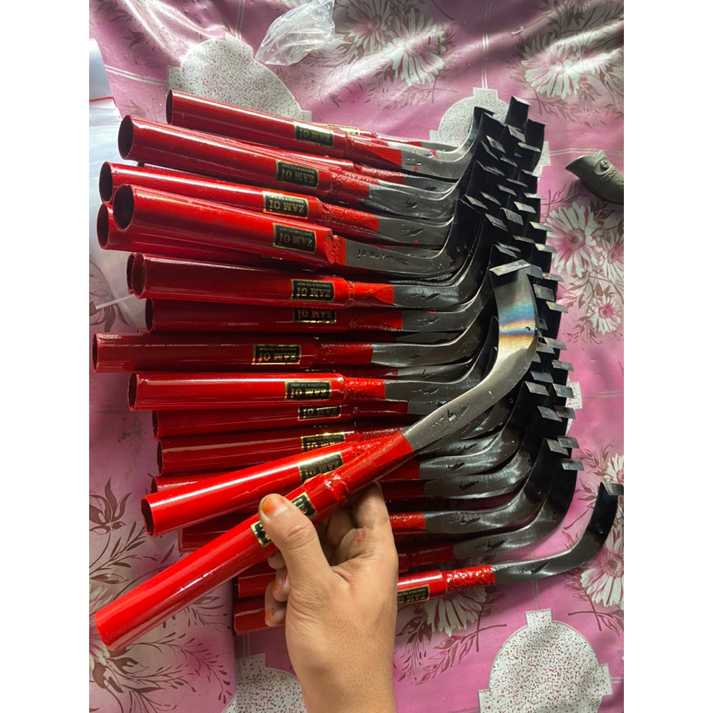 sadap karet besi rel( alat menoreh kebun karet)