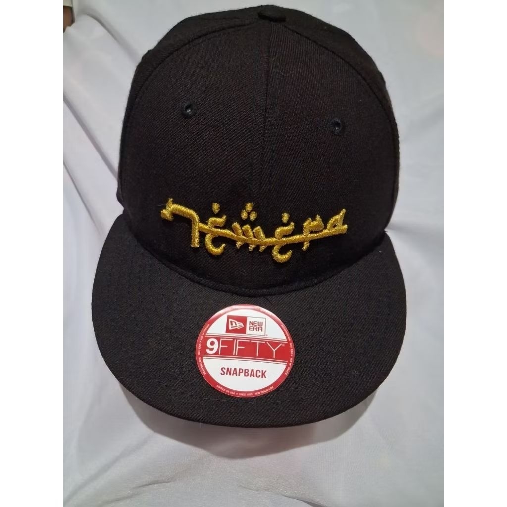 snapback new era arabic topi