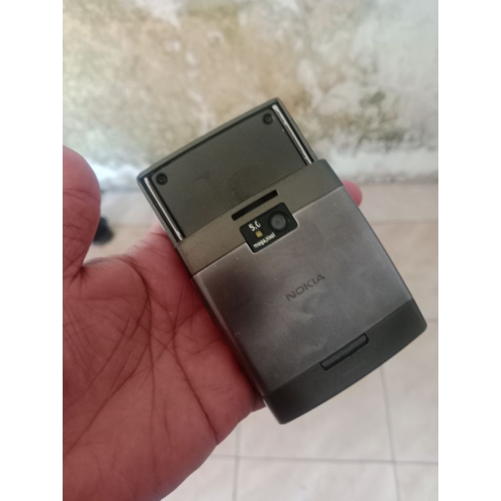 nokia x5-01 sleding bahan