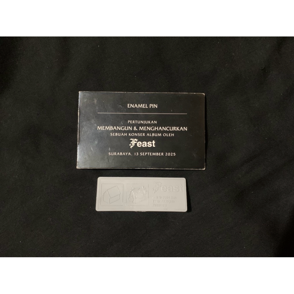 enamel pin .feast official from konser membangun & menghancurkan