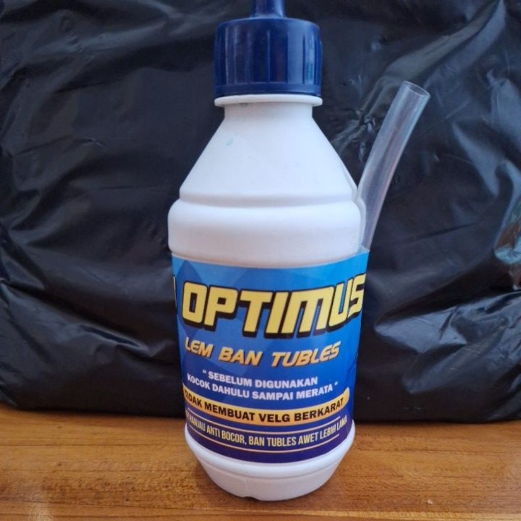 cairan lem ban tubles merk optimus