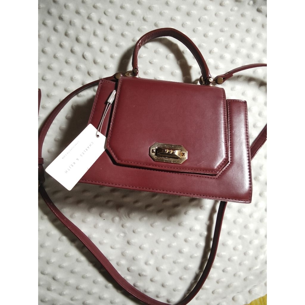 Tas Charles and keith maroon
