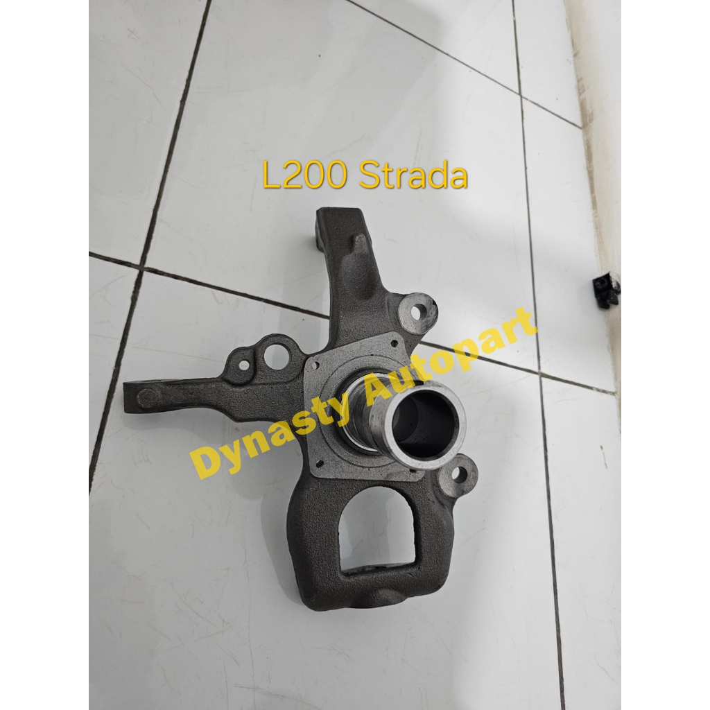 Knuckle depan mobil L200 Strada triton