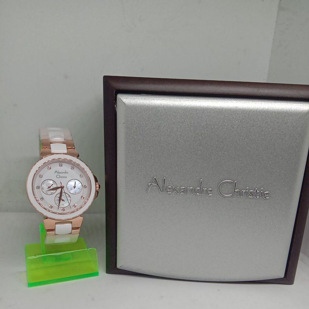 Jam Tangan Alexandre Christie (2B02BF) Tali Rantai Warna Gold Kombinasi Keramik warna Putih (Pemakai