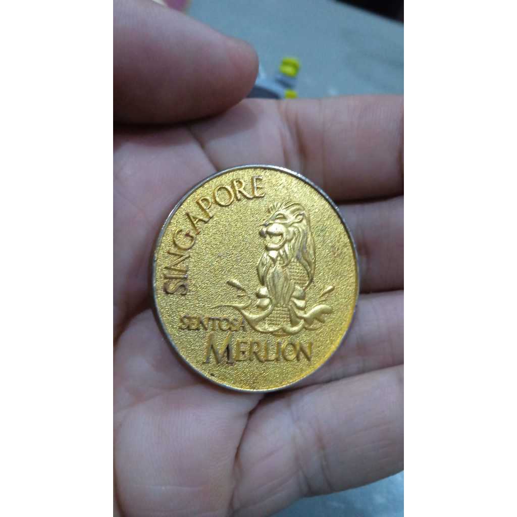 medali koin logam singapura merlion bekas