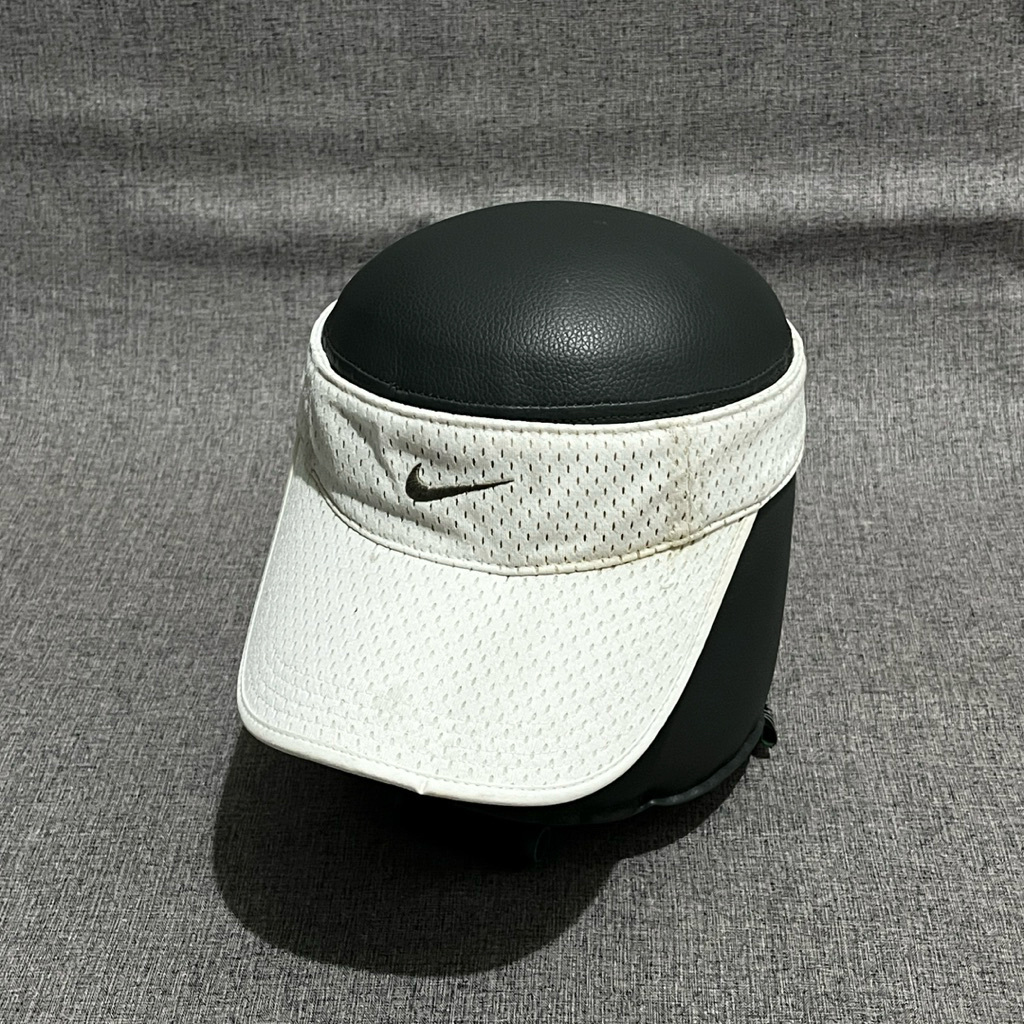 topi golf nike