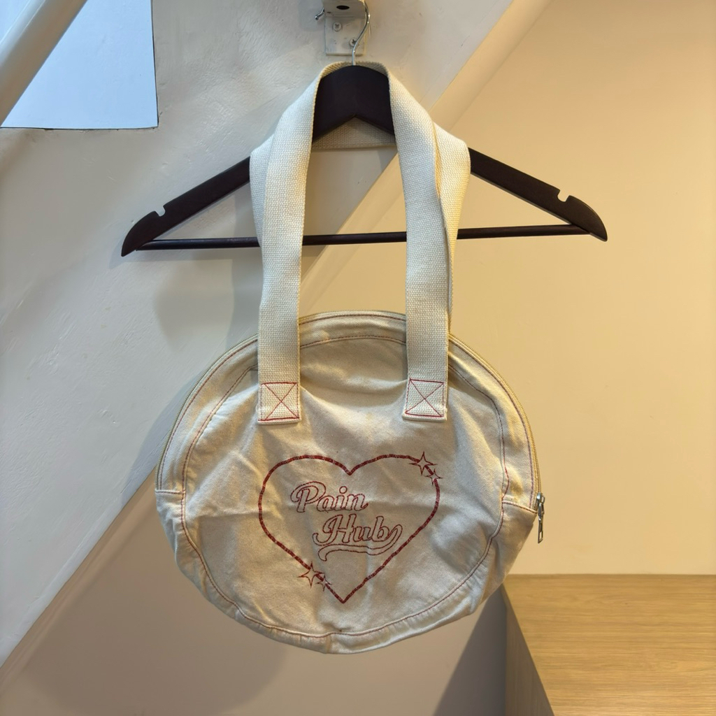 studio archive tas toto bag bulat round cream canvas kuliah