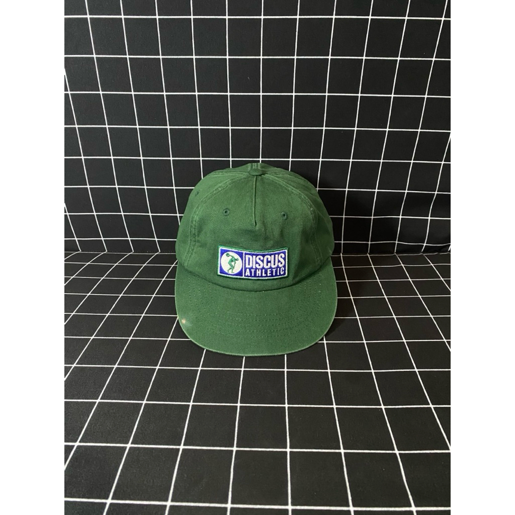 Topi discus athletic hijau