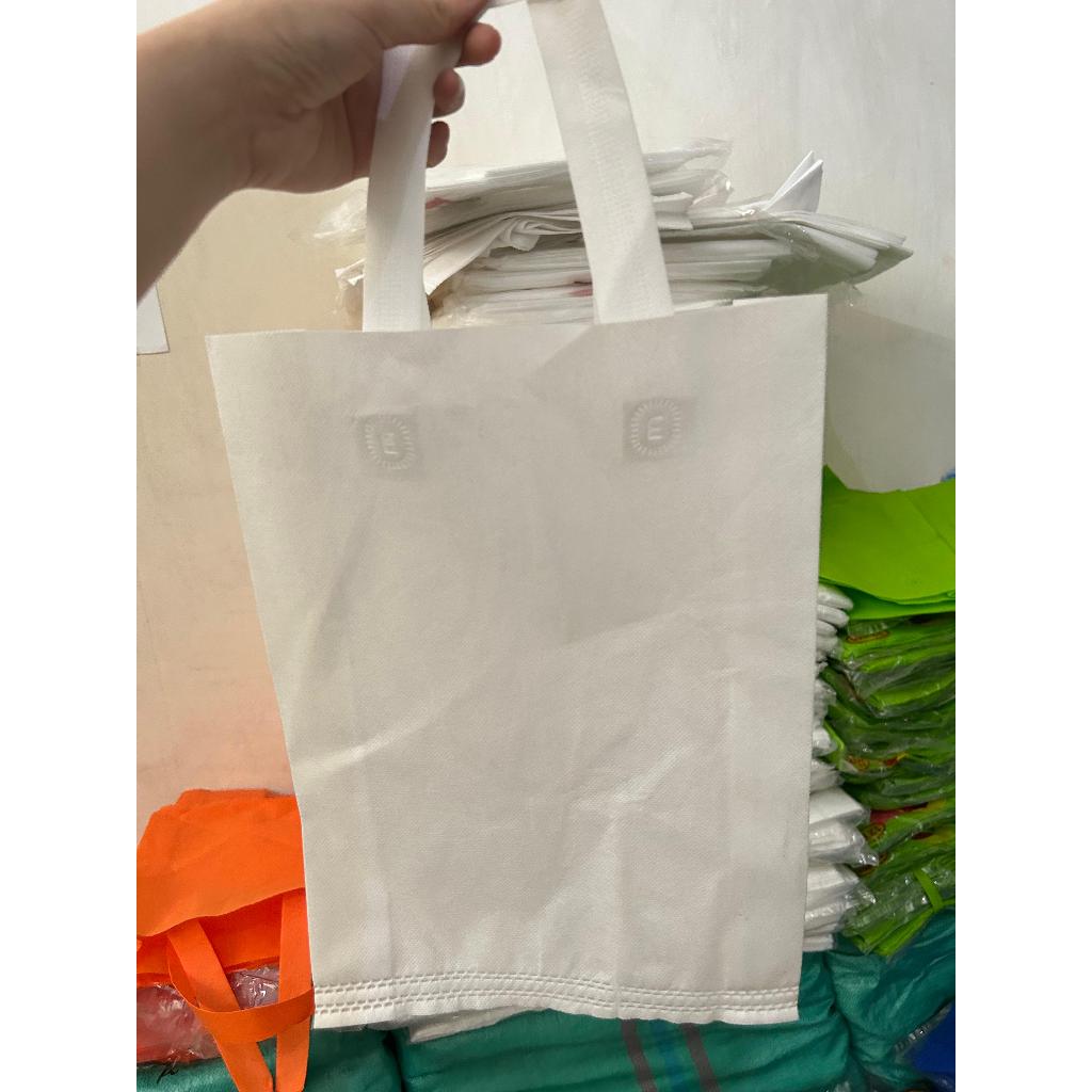 GOODIE BAG/ HANDLE LIPAT SAMPING/ TAS SPUNBOND / TOTEBAG 25x35x8(HLS)