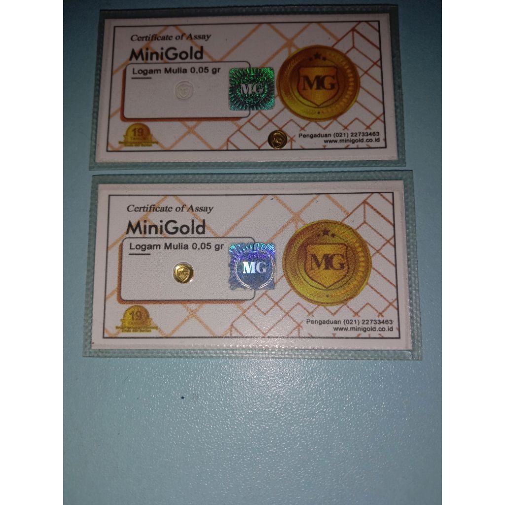 logam mulia , mini gold 0,05 gr kadar emas 99,9%