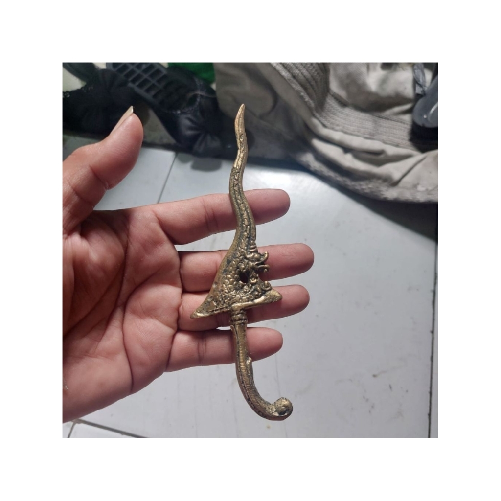 keris naga kuningan
