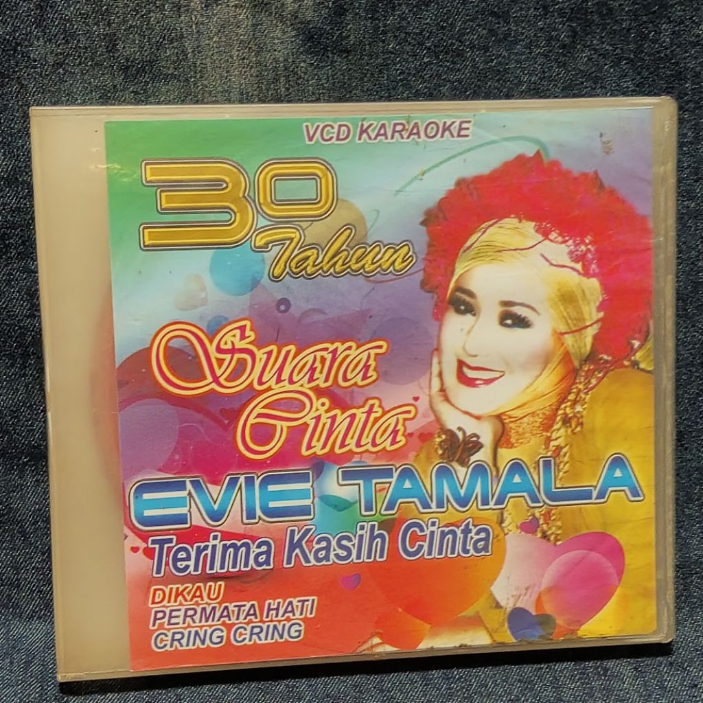 VCD Dangdut Karaoke Evie Tamala 30 Tahun Suara Cinta