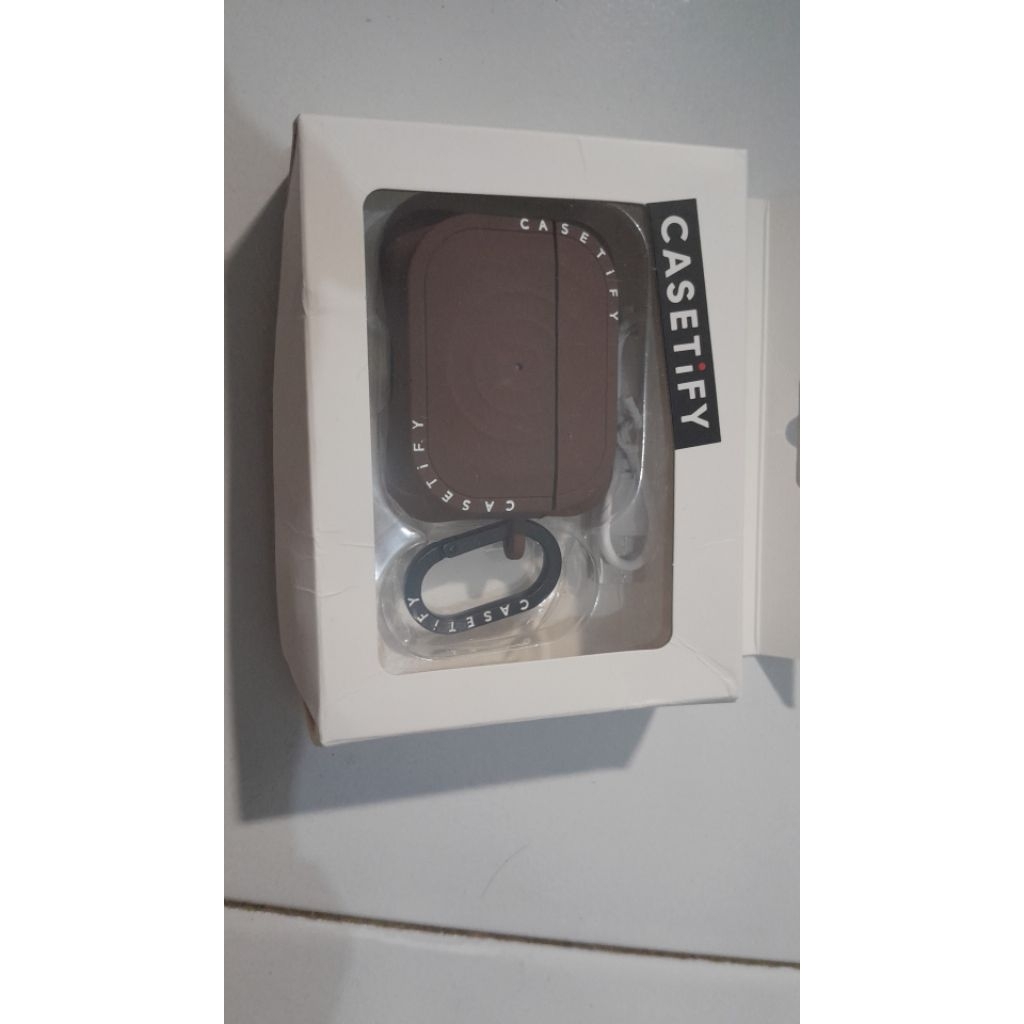CASETIFY earphone sudah termaksud casing coklatnya BARU,ORI,MEWAH