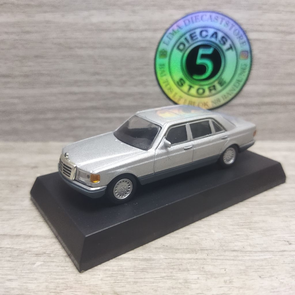 Kyosho skala 1/64 mercedes benz 560 SEL silver