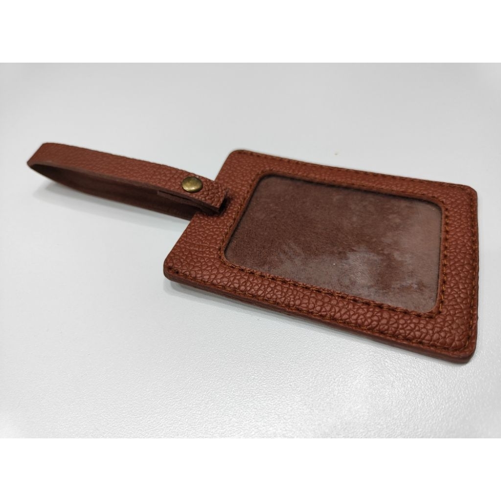 Nametag untuk koper warna coklat