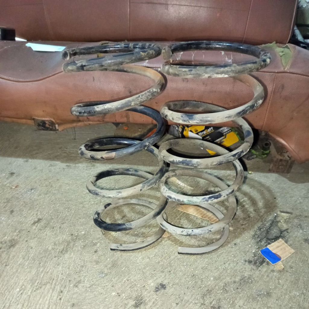 per spiral KIA Carens 1 depan