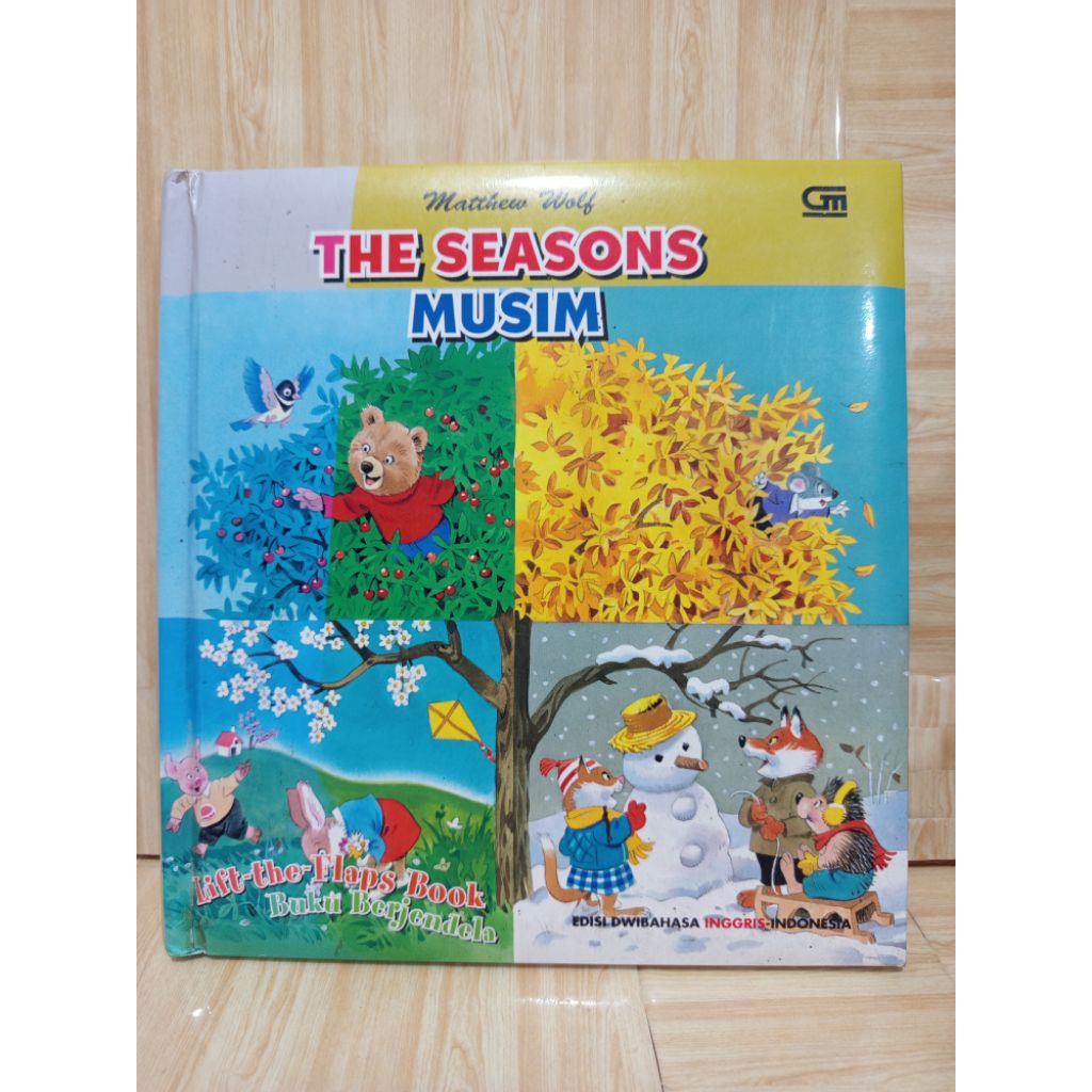 The Seasons Musim Lift The flap Book by Matthew Wolf