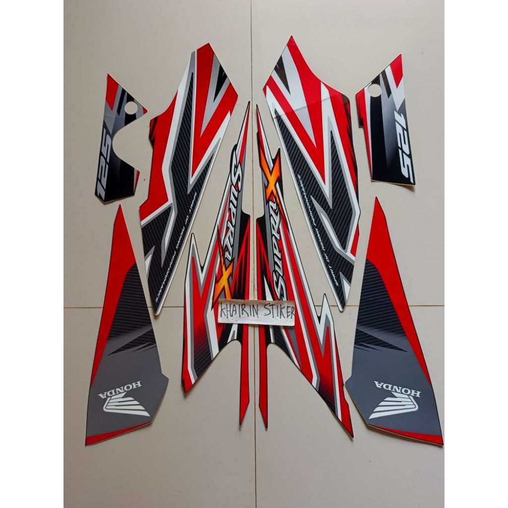 striping stiker Supra x 125 merah hitam 2012 jari original