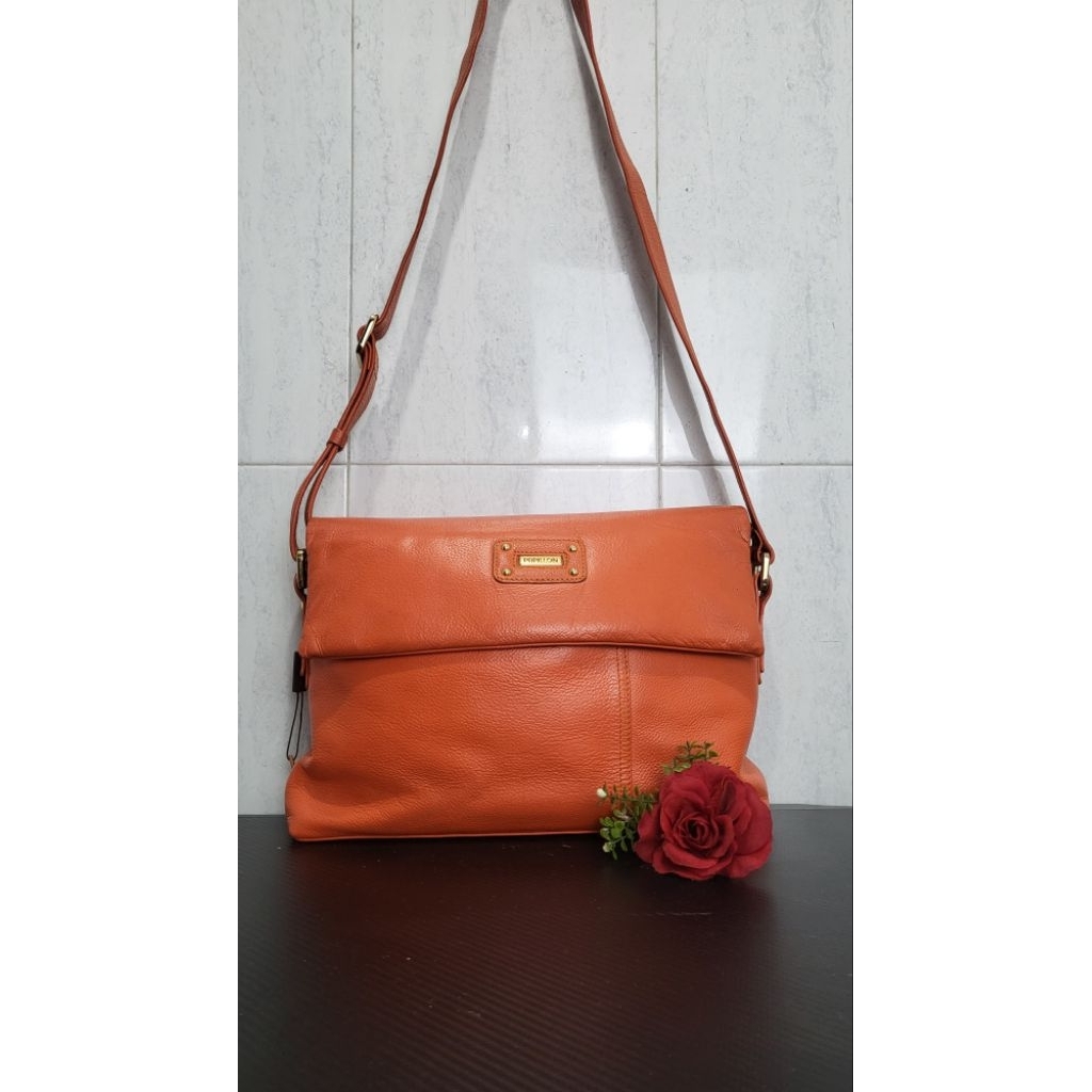 Tas Slempang Papilon Second Warna Oren Like New (koleksi pribadi)