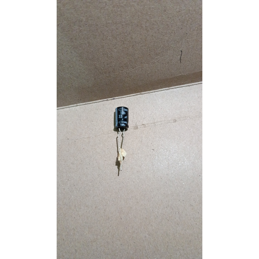 5614 kapasitor elco 33uf 33 uf 100v 100volt 100 volt nippon chemicon