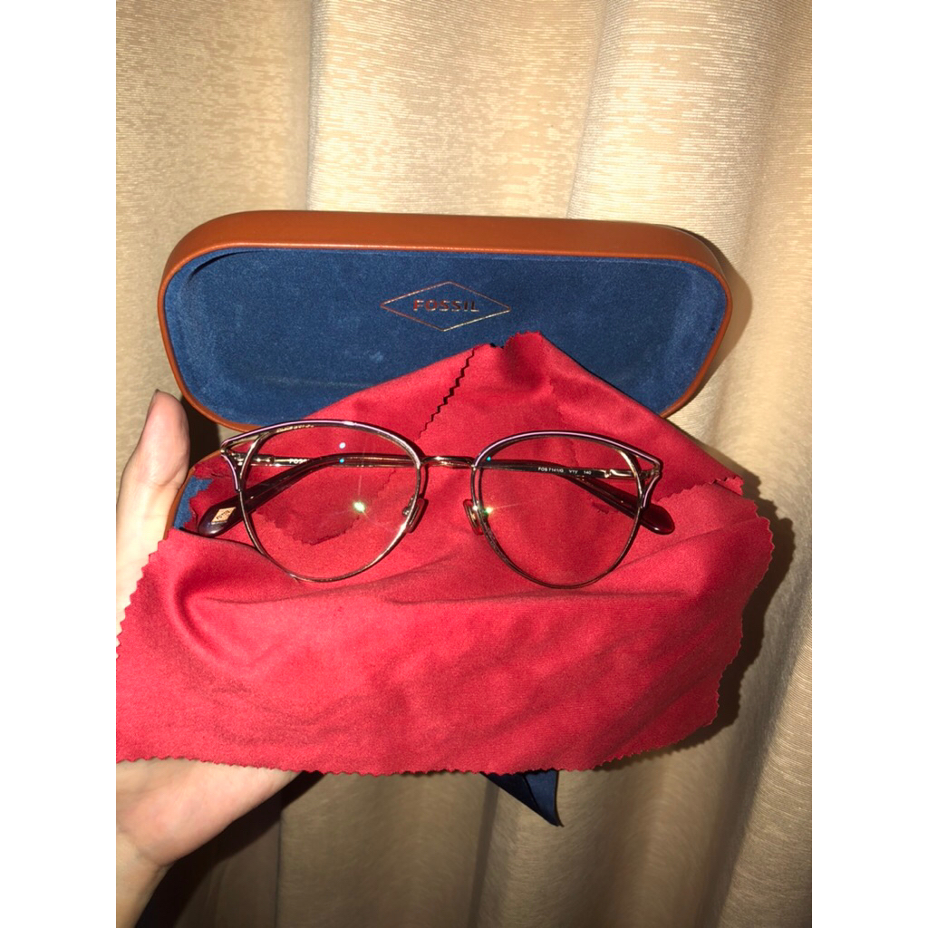 KACAMATA FOSSIL BY OPTIK MELAWAI