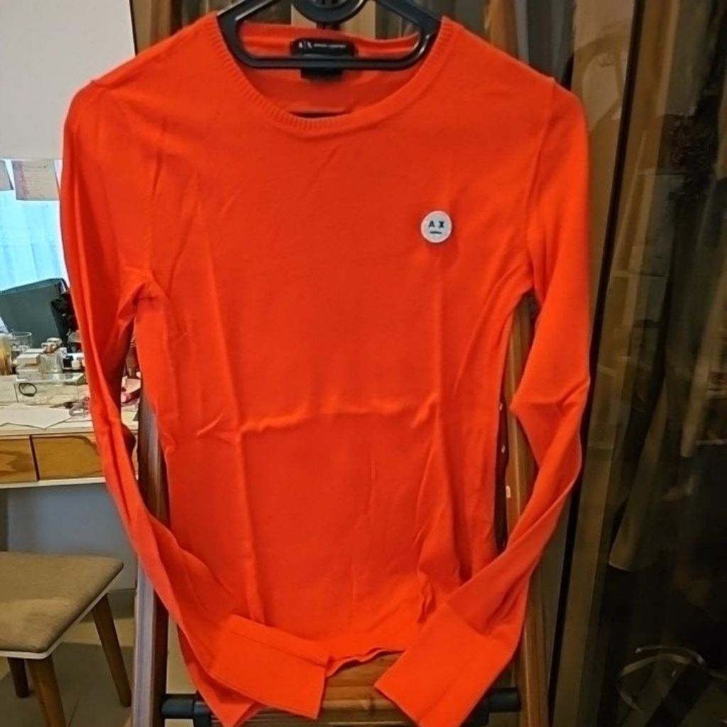 AX orange sweater