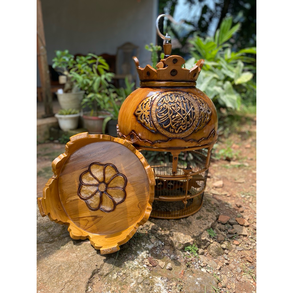 sangkar ukir burung perkutut motif kaligrafi