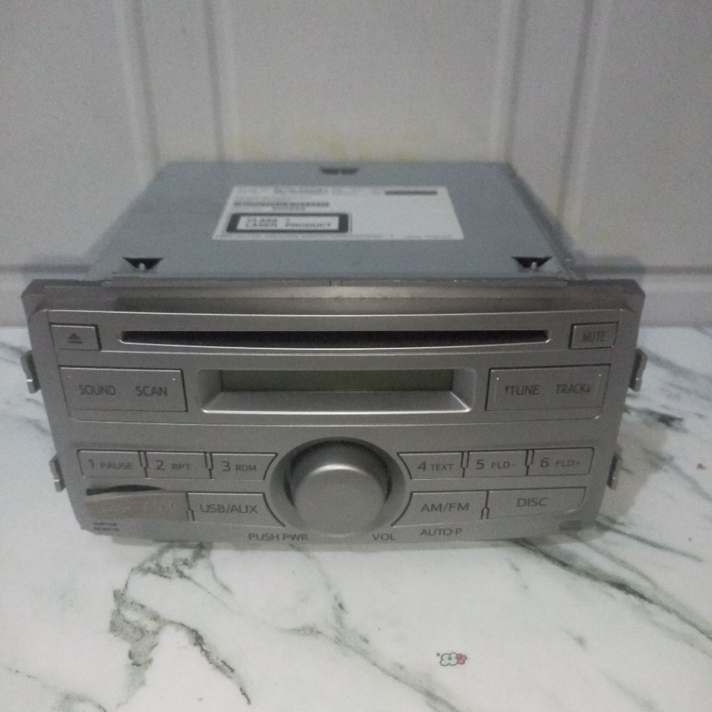 Head Unit Copotan Daihatsu Ayla bekas normal