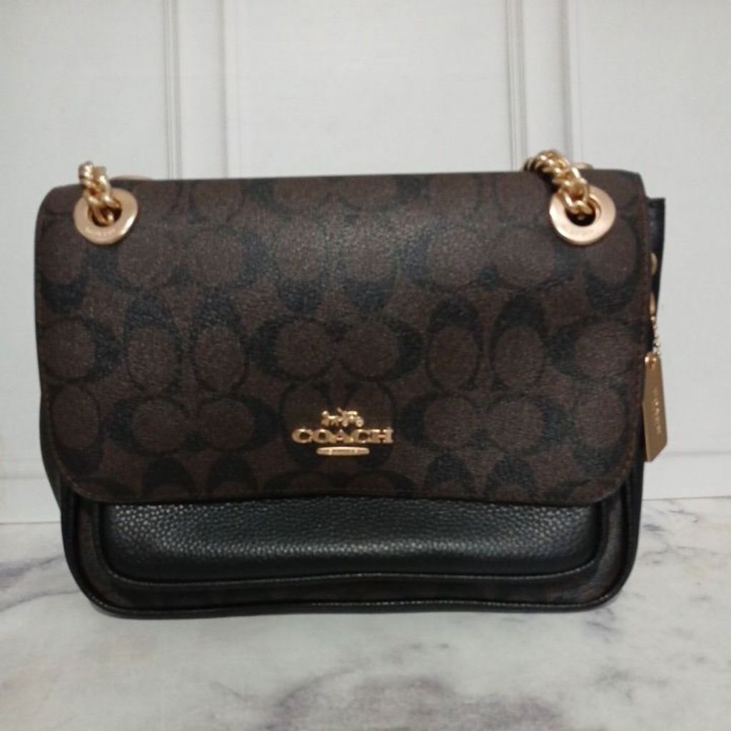 Tas Coach wanita preloved bisa sling dan shoulder dengan desain yang mewah dan elegan