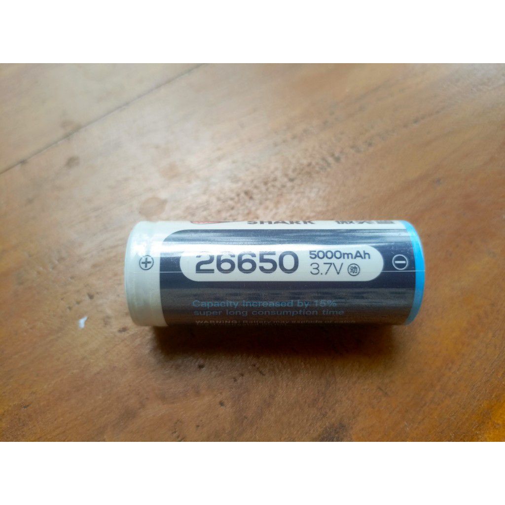 Baterai 26650 5000mah original Smiling Shark copotan senter