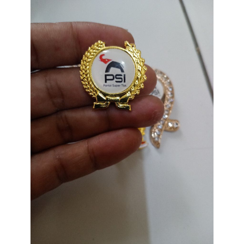 pin logo PSI tbk terbaru peniti