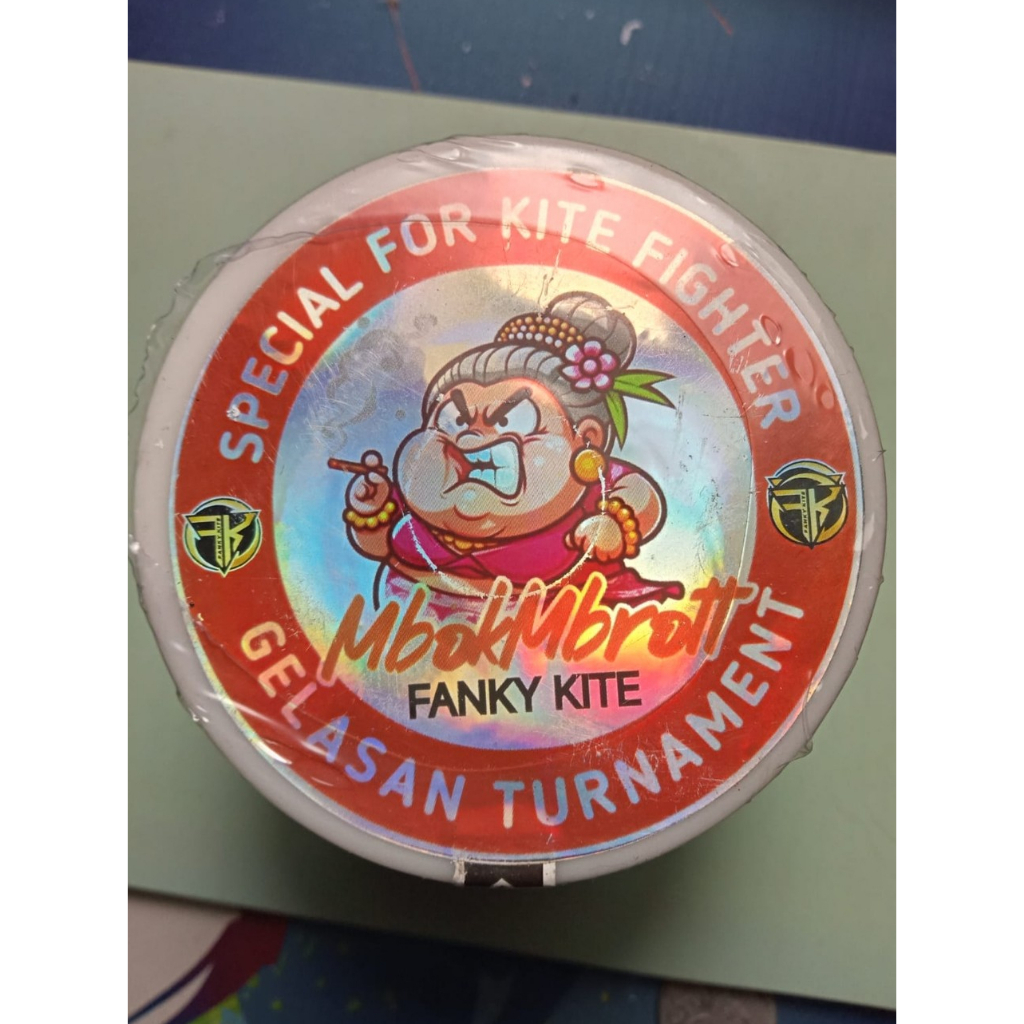 Gelasan Matot Mbok Mbrott 6000 Yard Bahan Putih Klos Gading 0.23 – Senar Layangan Kuat Aduan Premium