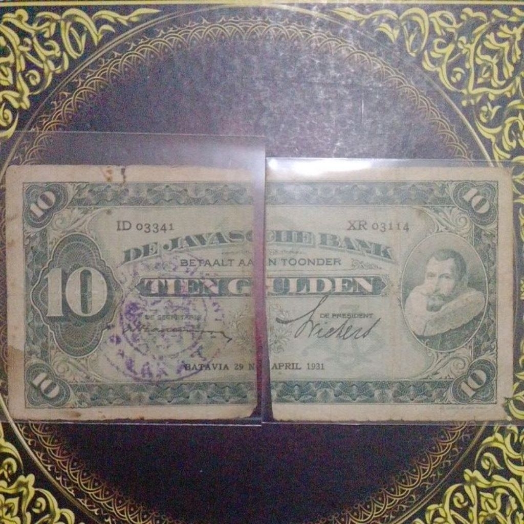 Uang Coen 10 gulden 1931 senering kanan kiri ada cap RMS fine