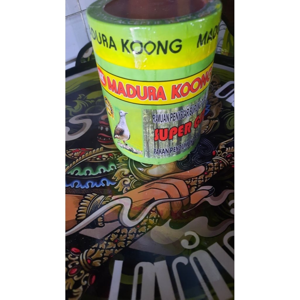 MADURA KOONG PAKAN BURUNG PERKUTUT