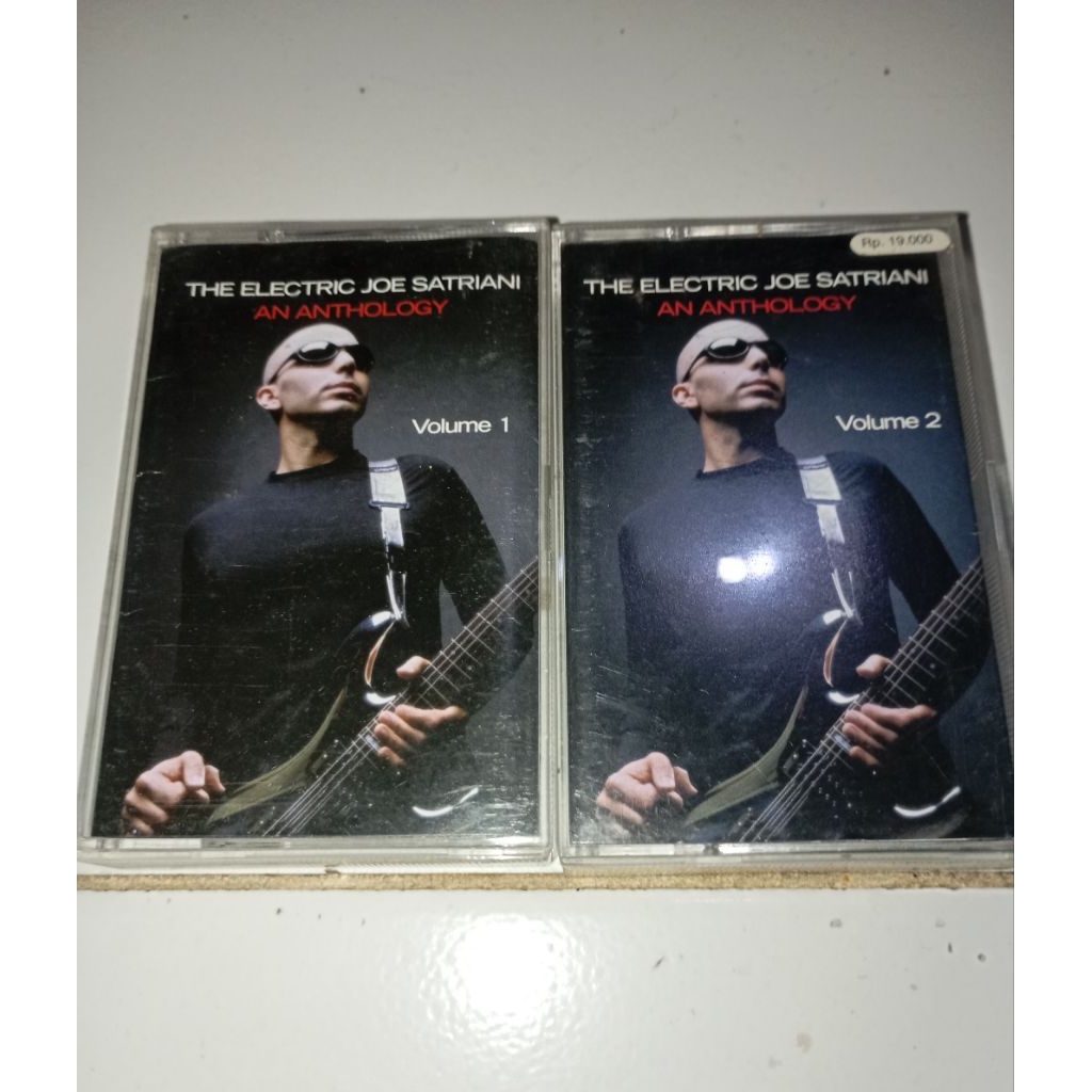 Kaset Pita Joe Satriani The Electric An Anthology Vol 1 & 2 Original Album Instrument Gitar Bekas No