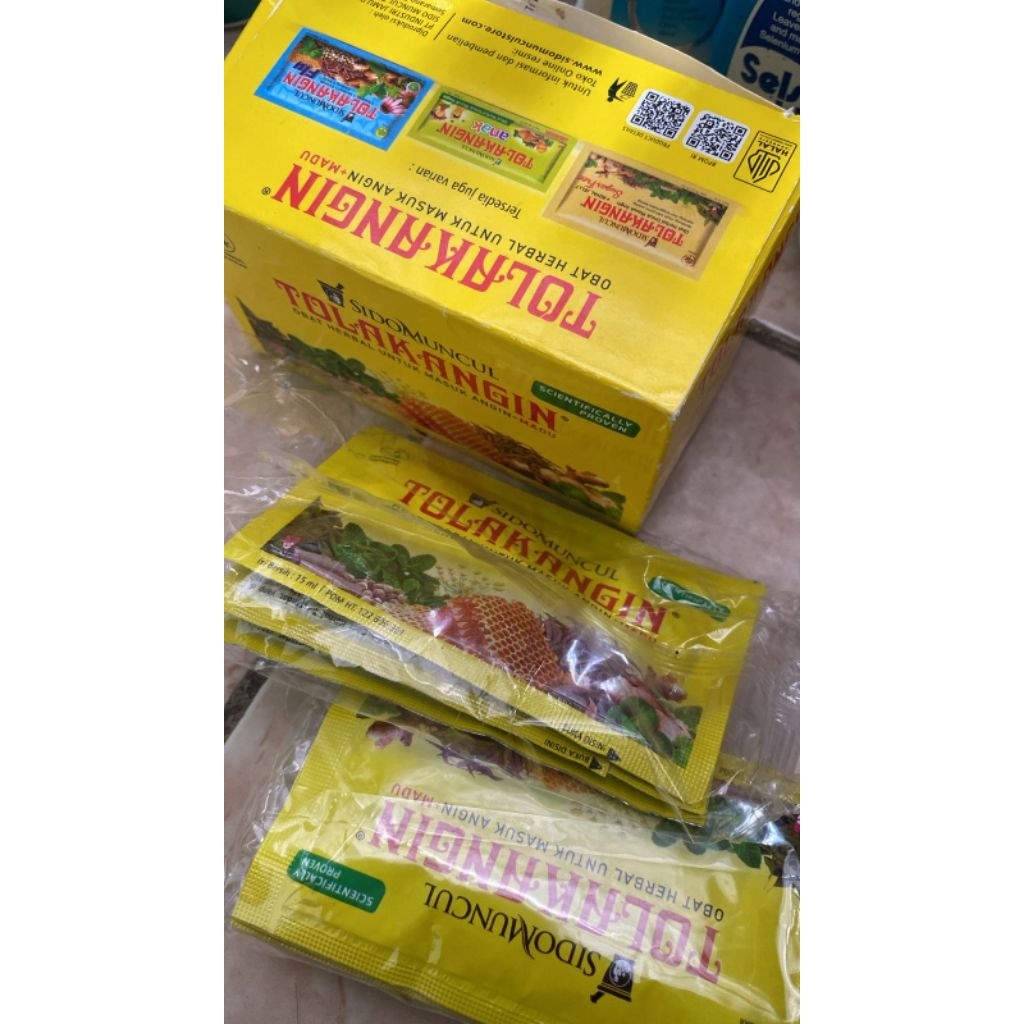 tolak angin cair  isi 12