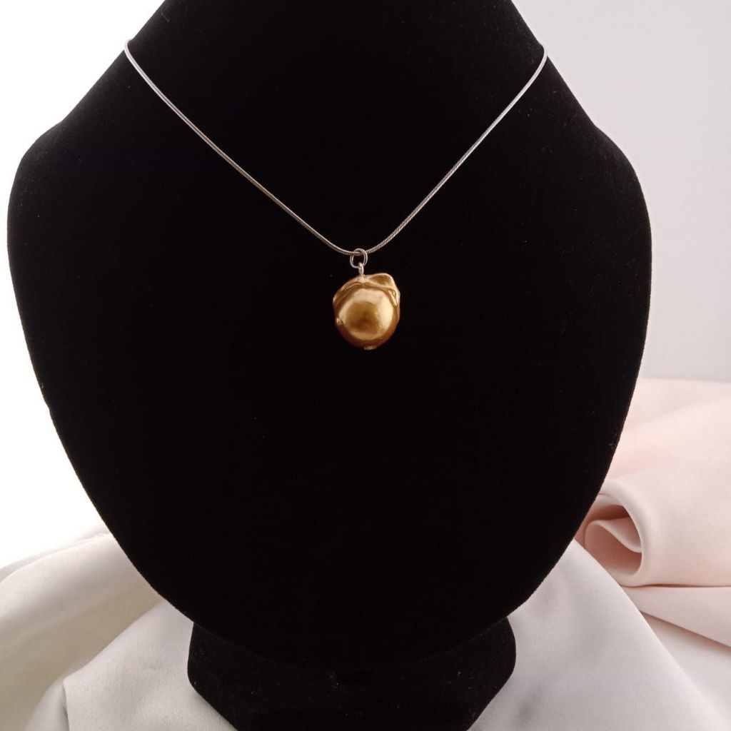 Kalung Mutiara Baroque  Spesifikasi : - Mutiara Baroque - Ikat Rhodium