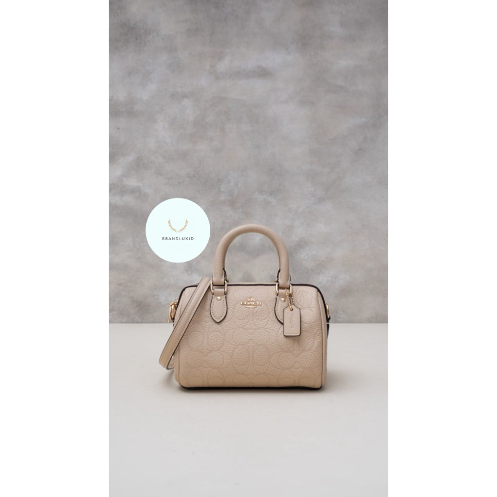 Coach Mini rowan crossbody bag in signature canvas & leather