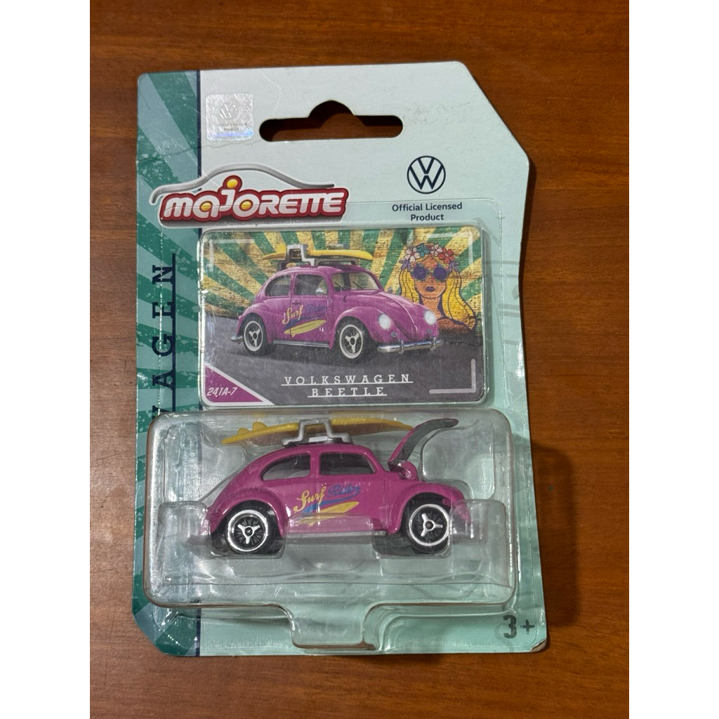 Volkswagen beetle with surf board majorette