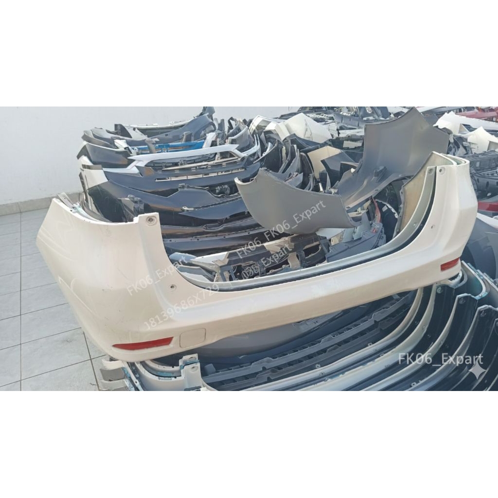 bumper belakang xenia 2012