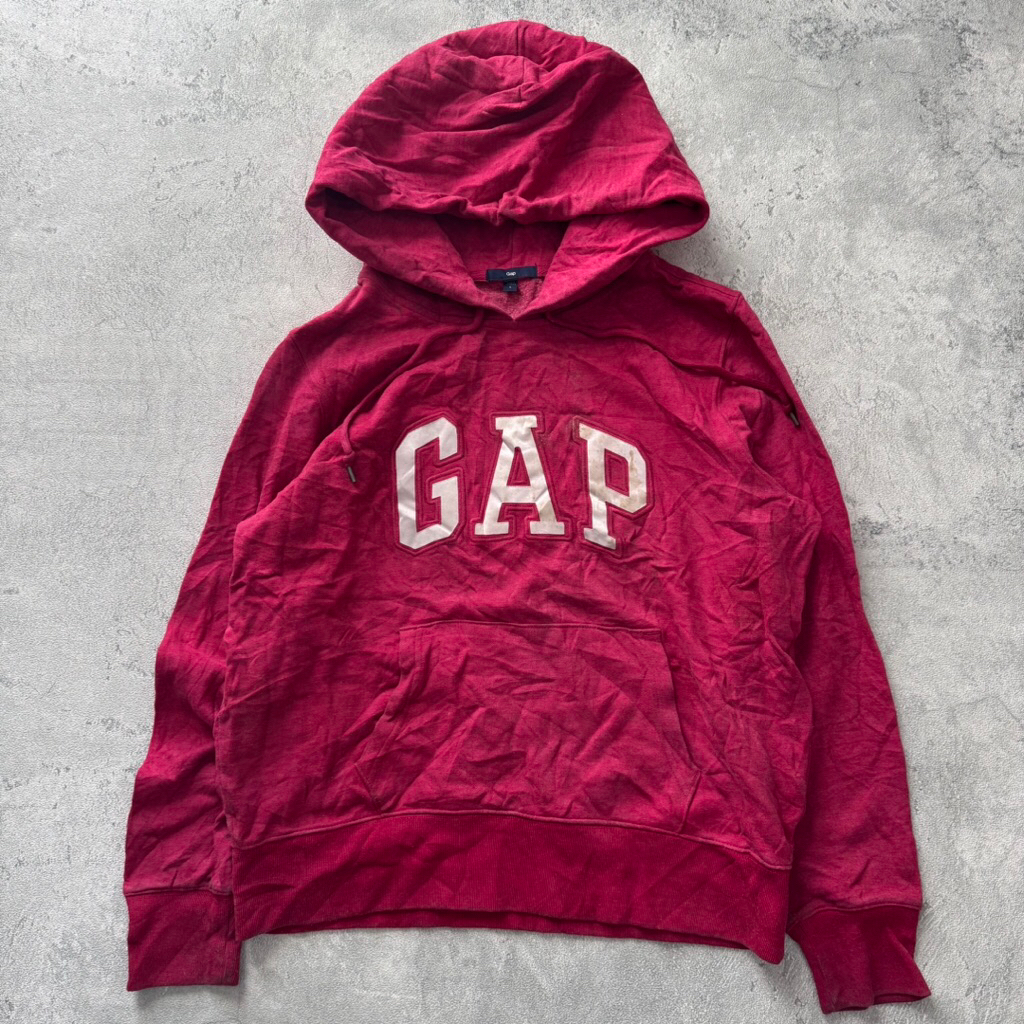 Gap hoodie is a pink colour with a logo on the chest