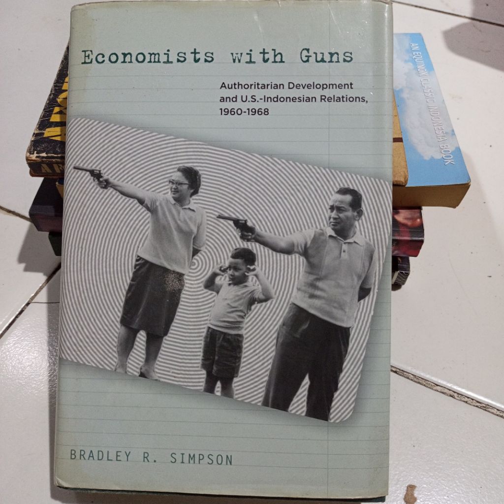 Economists with Guns.  Brabley R. Simpson
