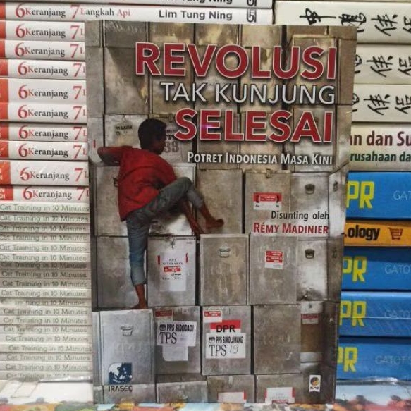 BUKU ORIGINAL REVOLUSI TAK KUNJUNG SELESAI REMY MADINIER