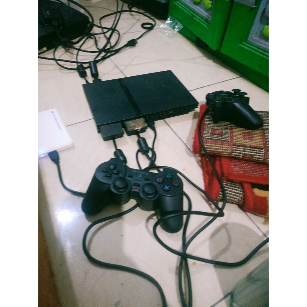 ps2 slim bekas  dapat hardisk 320 gb stik 2 original dan memori save