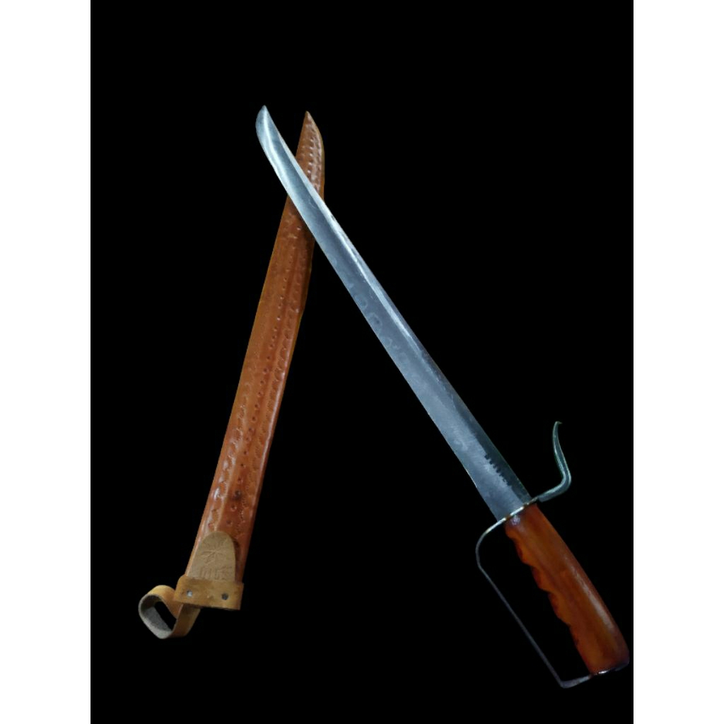 pisau/kalewang bertuliskan arab