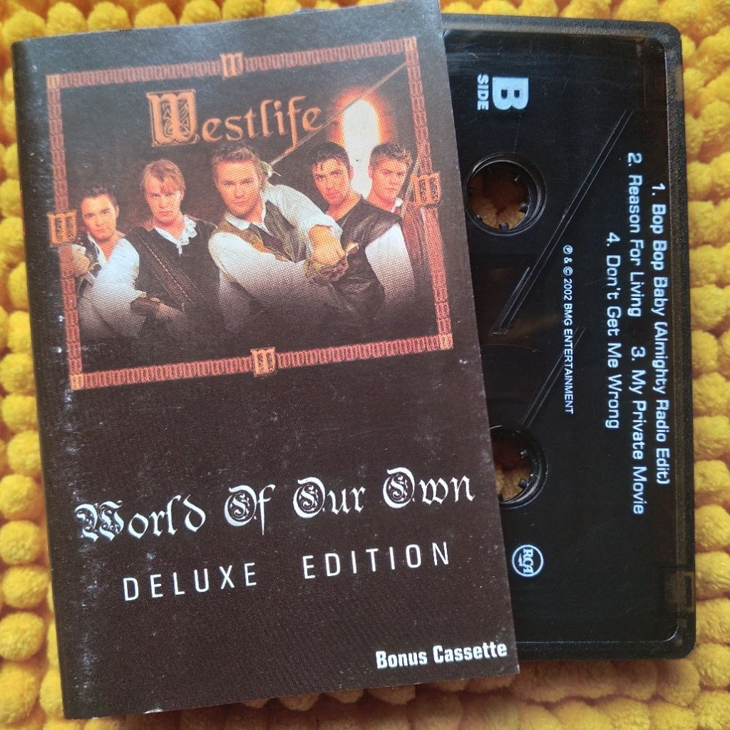 KASET PITA WESTLIFE - WORLD OF OUR OWN DELUXE EDITION BONUS CASSETTE