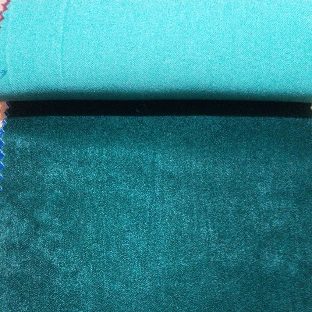 Gorden kain lokal warna hijau botol